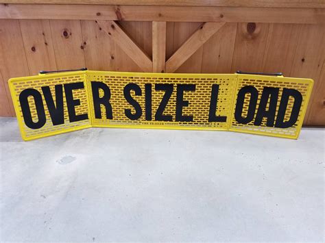 foldable oversize load sign.